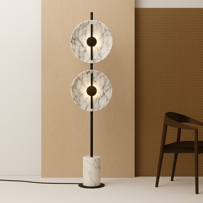 Modern floor lamp with two circular marble pendant lights shades in a minimalistic room.
