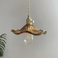 Brighten your space with the Nordic LED Pendant Light – Colorful Glass, featuring a chic copper finish and elegant design.