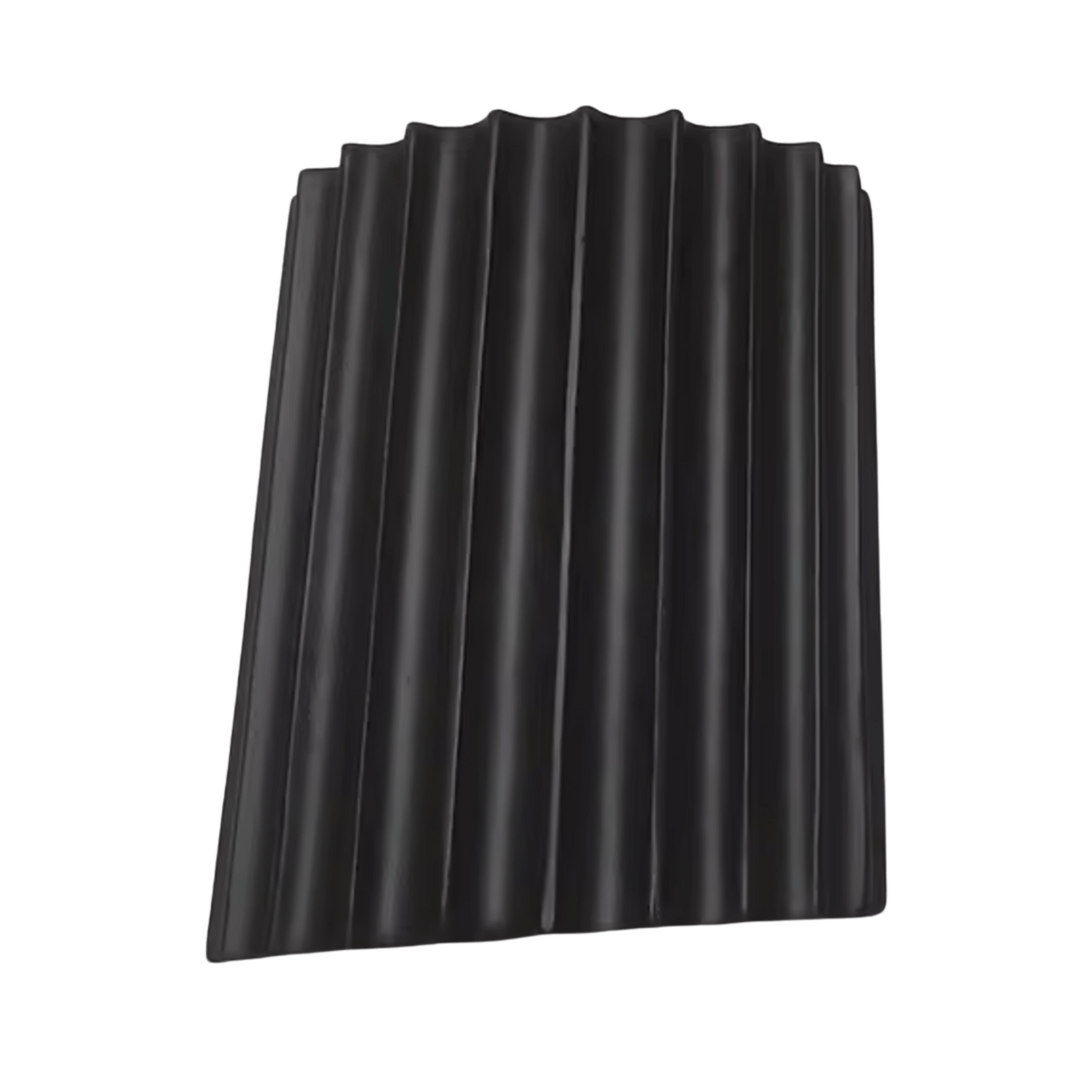 Black corrugated plastic sheet on a white background