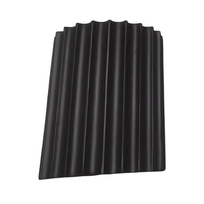 Black corrugated plastic sheet on a white background