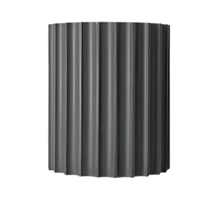 Black ribbed cylindrical object on a white background