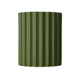 Green corrugated metal panel on a white background