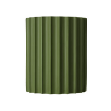 Green corrugated metal panel on a white background
