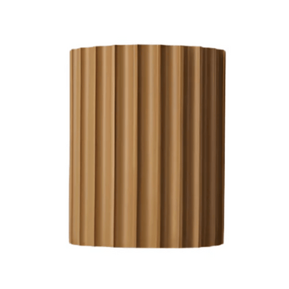 Wooden vase with vertical ribbed design on a white background