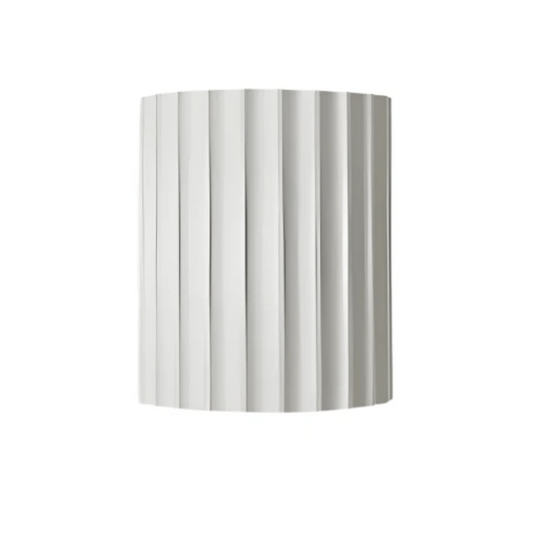 Silver cylindrical object with vertical stripes on a white background