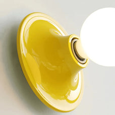 Yellow light fixture on a white background