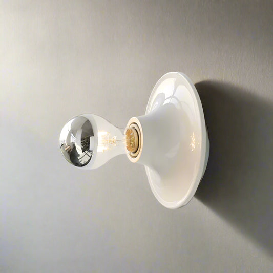 Wall-mounted light fixture on a white background with 'White' label.