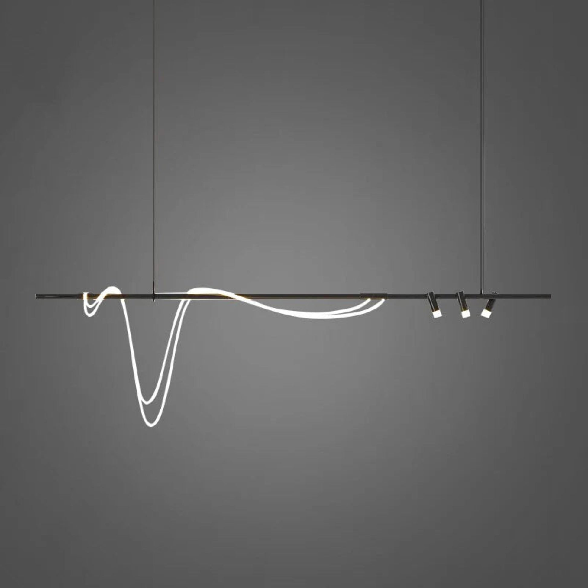Modern pendant light with white cable and three small lights on a gray background