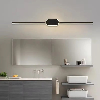 Modern bathroom with a sleek light fixture above a mirror