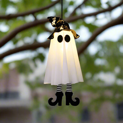 Halloween-themed ghost costume with a black hat, white cape, and striped socks on a white background