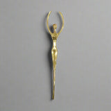 Gold decorative pull handle with measurements on a white background