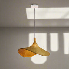 Woven pendant light on a neutral background