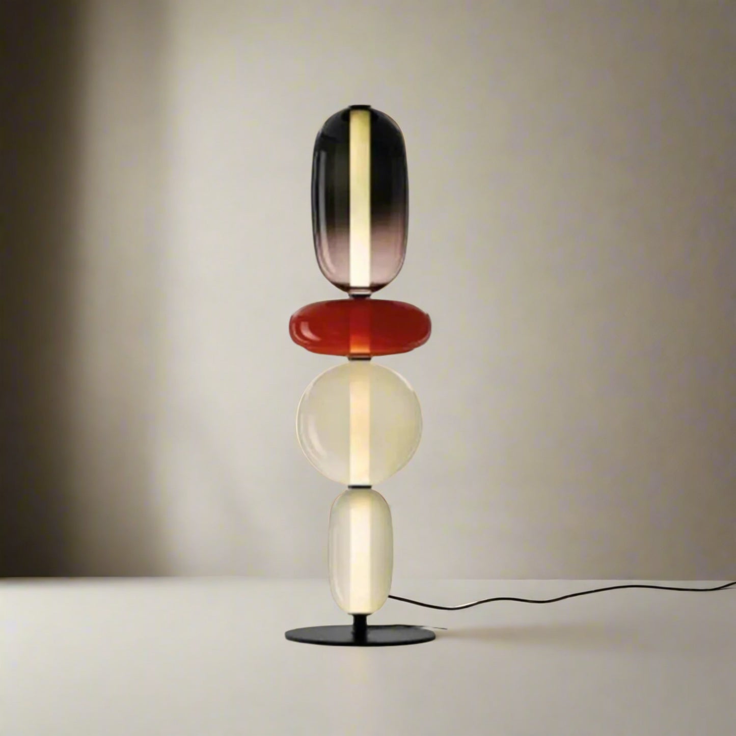 Table lamp with four colorful heads and dimensions on a white background


