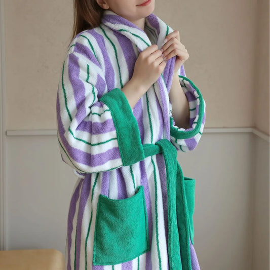 Person wearing a purple, green, and white striped robe.