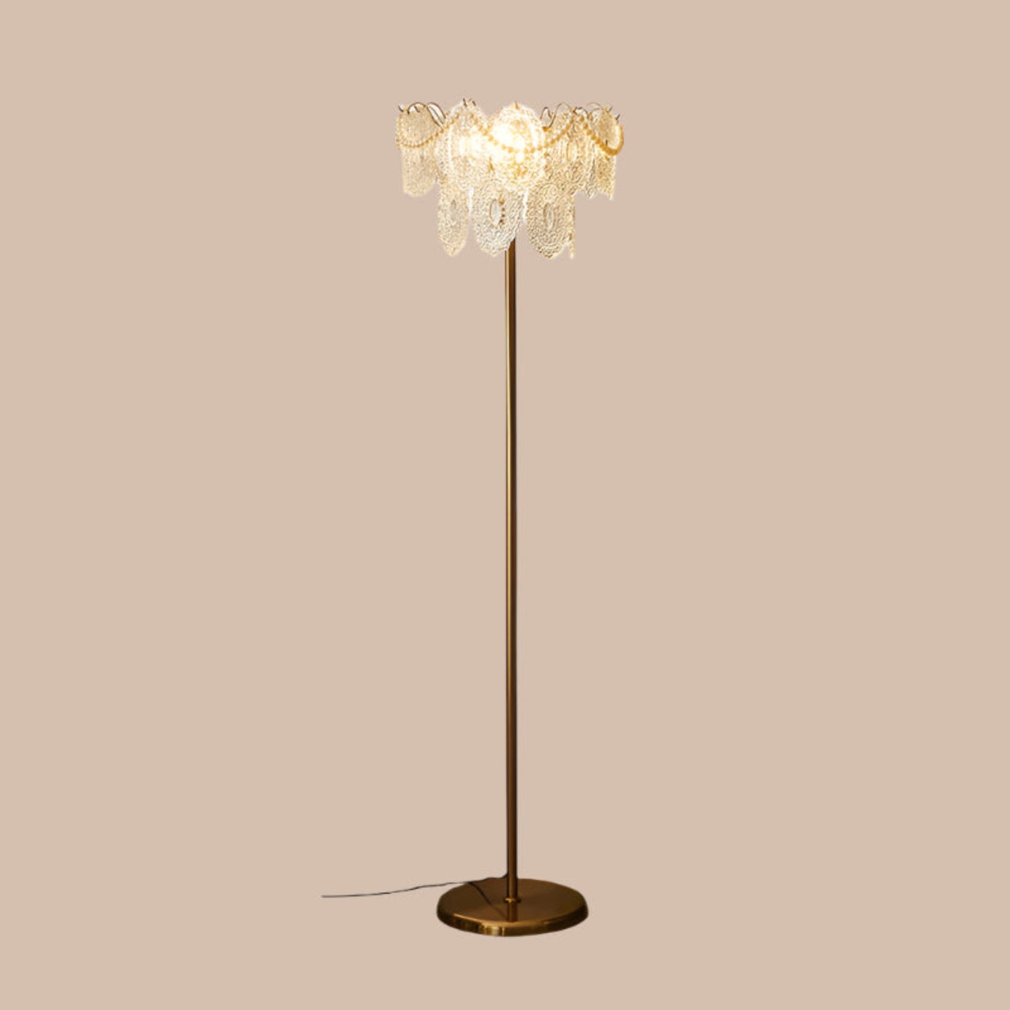 Decorative floor lamp with crystal details on a white background