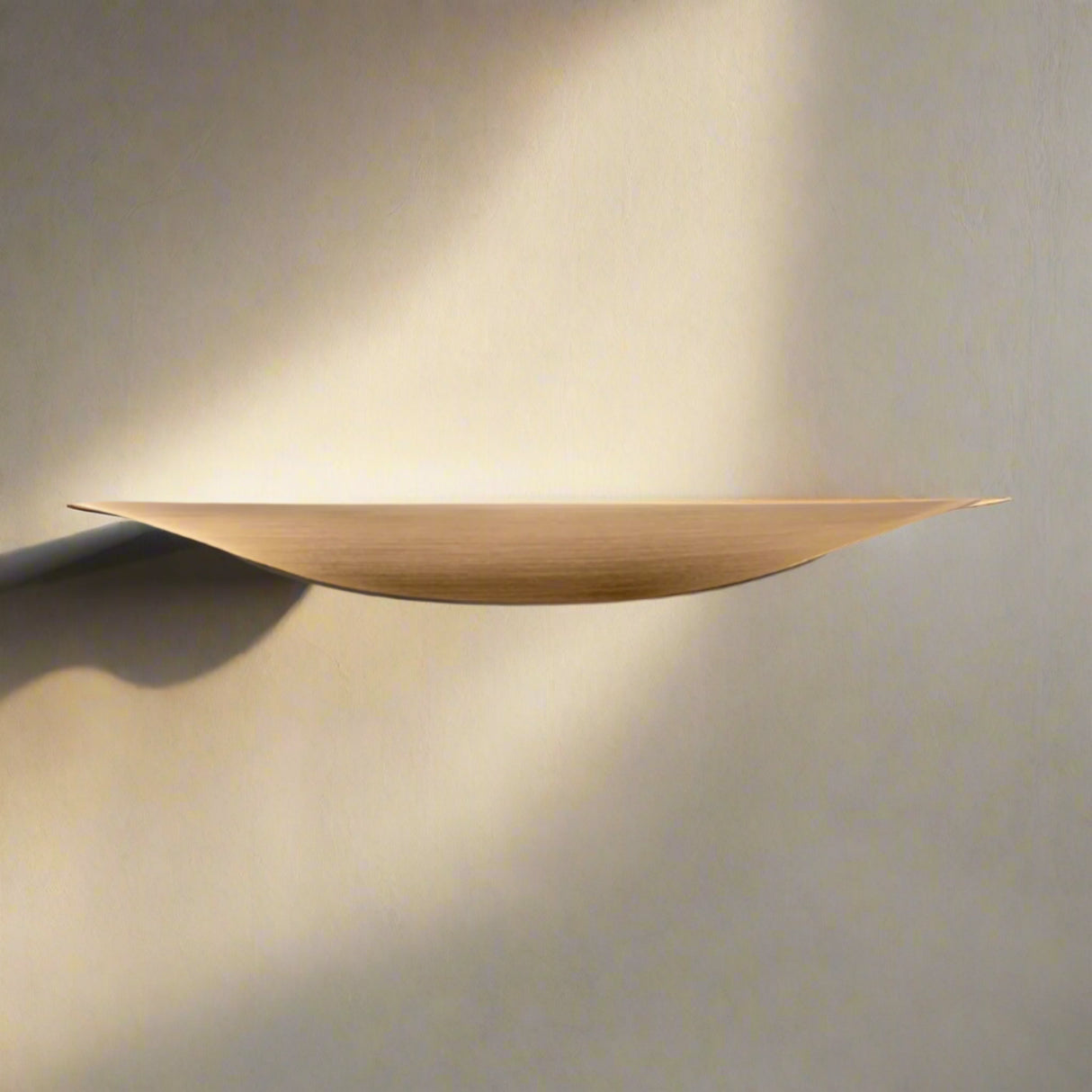 Wooden cabinet pull on neutral backround