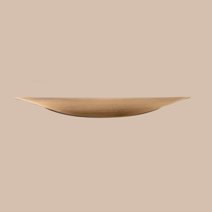 Wooden cabinet pull on neutral backround