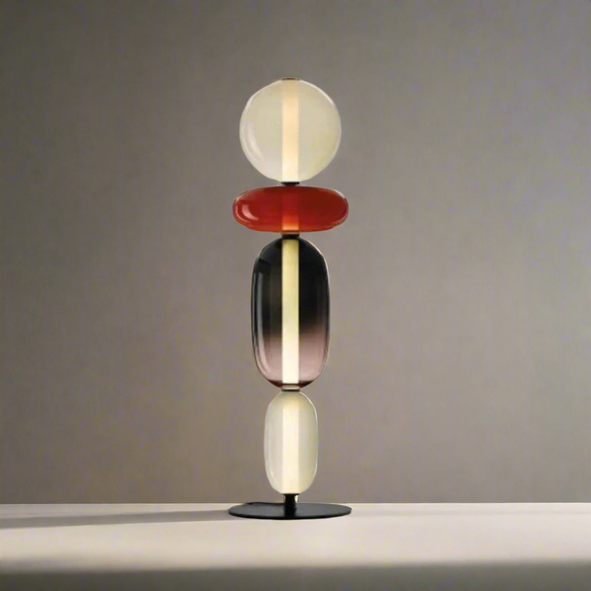 Table lamp with multicolored design and dimensions on a white background

