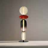 Table lamp with multicolored design and dimensions on a white background


