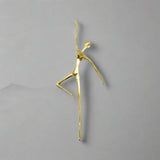 Gold ballet dancer cabinet handle decorative i on a white background