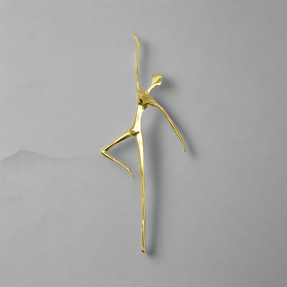 Gold ballet dancer cabinet handle decorative i on a white background