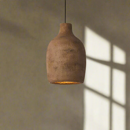 Brown pendant light on a plain background