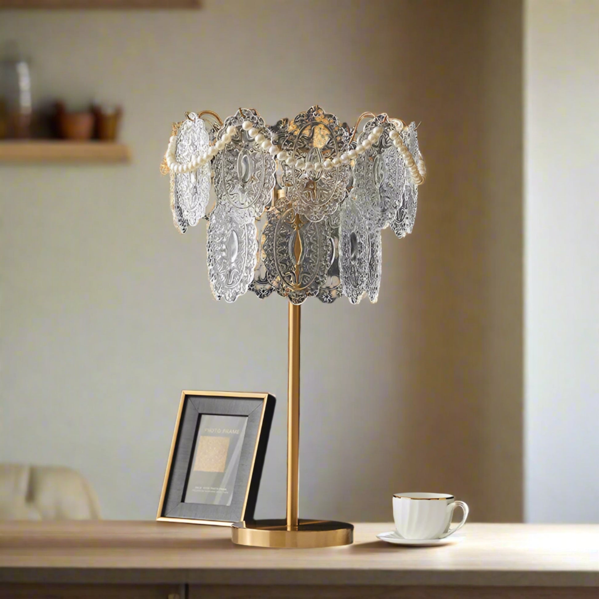 Decorative table lamp with lace shade on a dark wall background