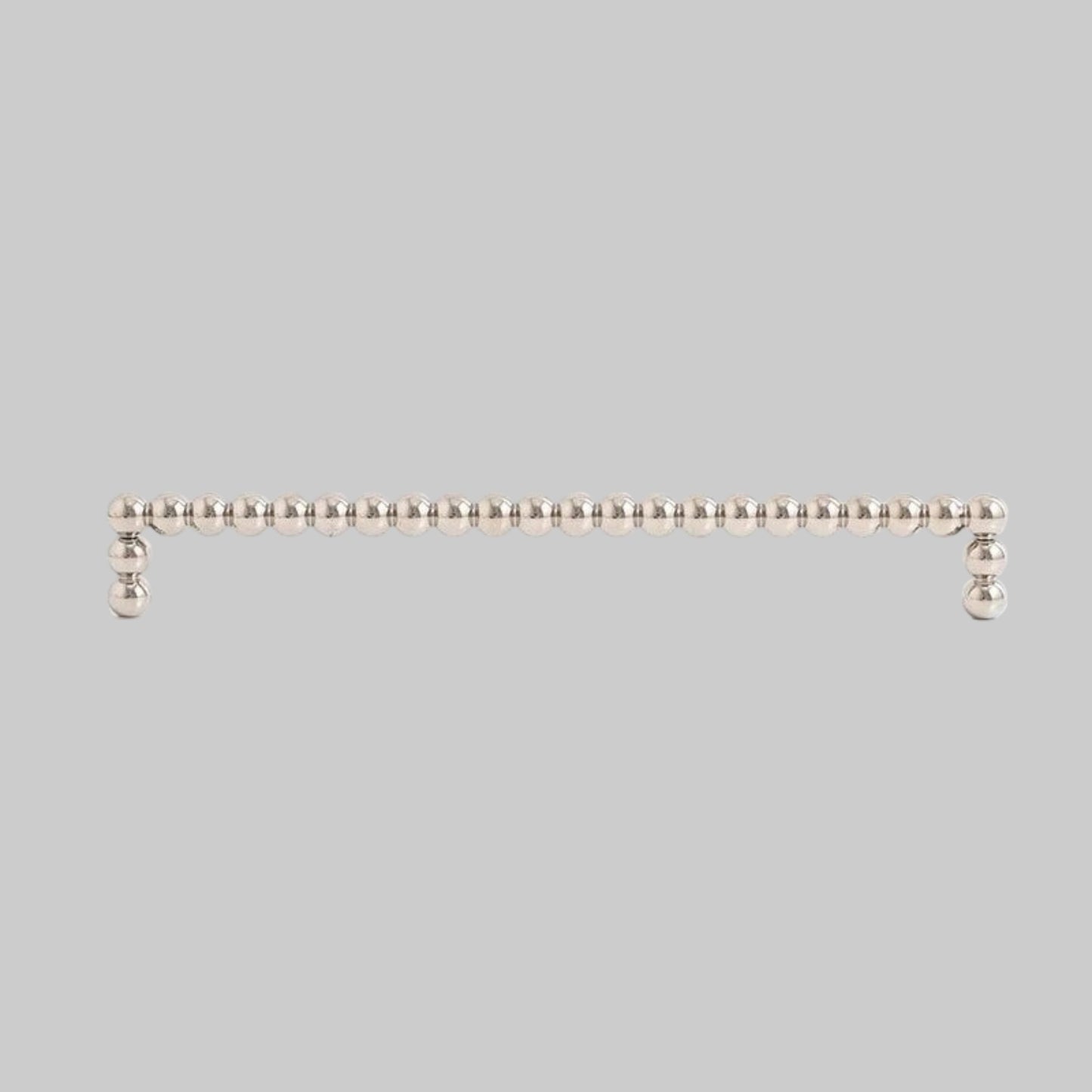 Measurement details of a metallic handle on a white background