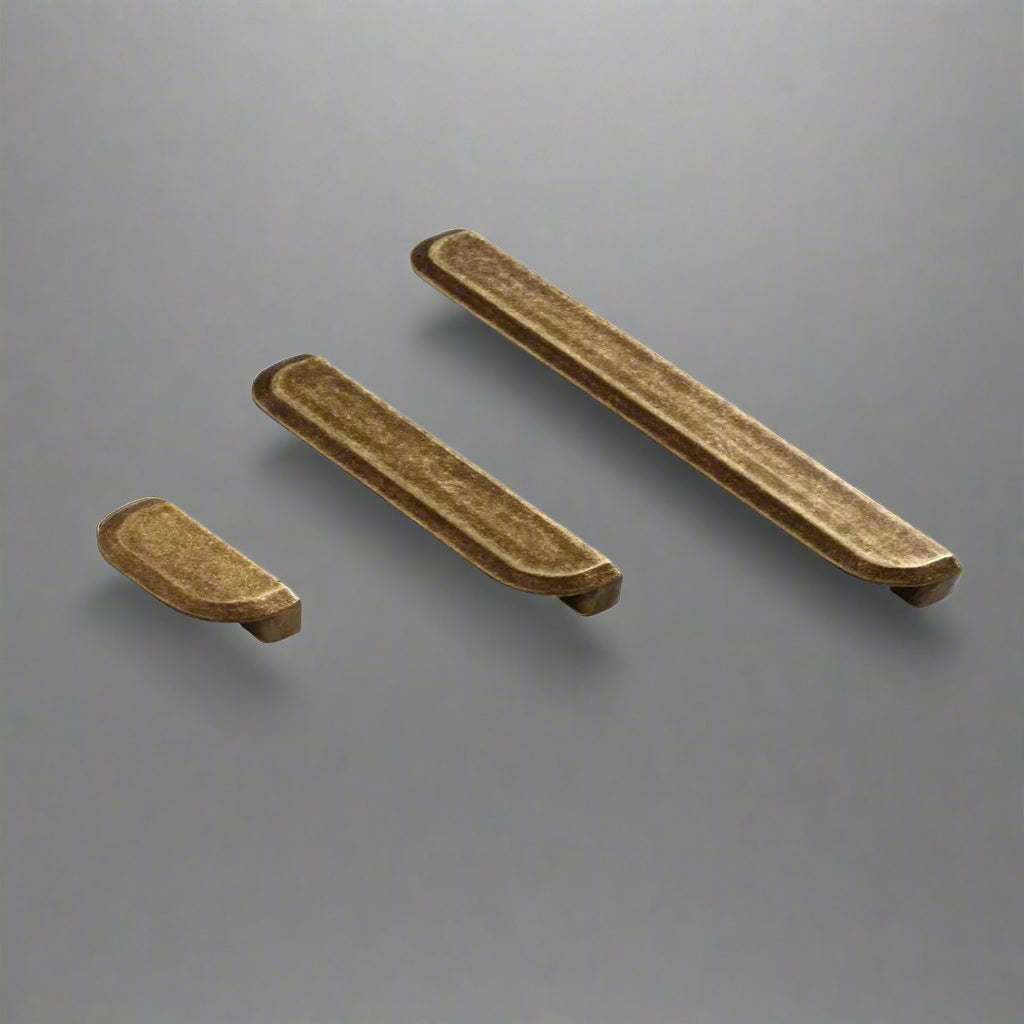 Three wooden pencils on a white background