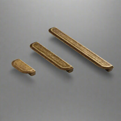 Three wooden pencils on a white background