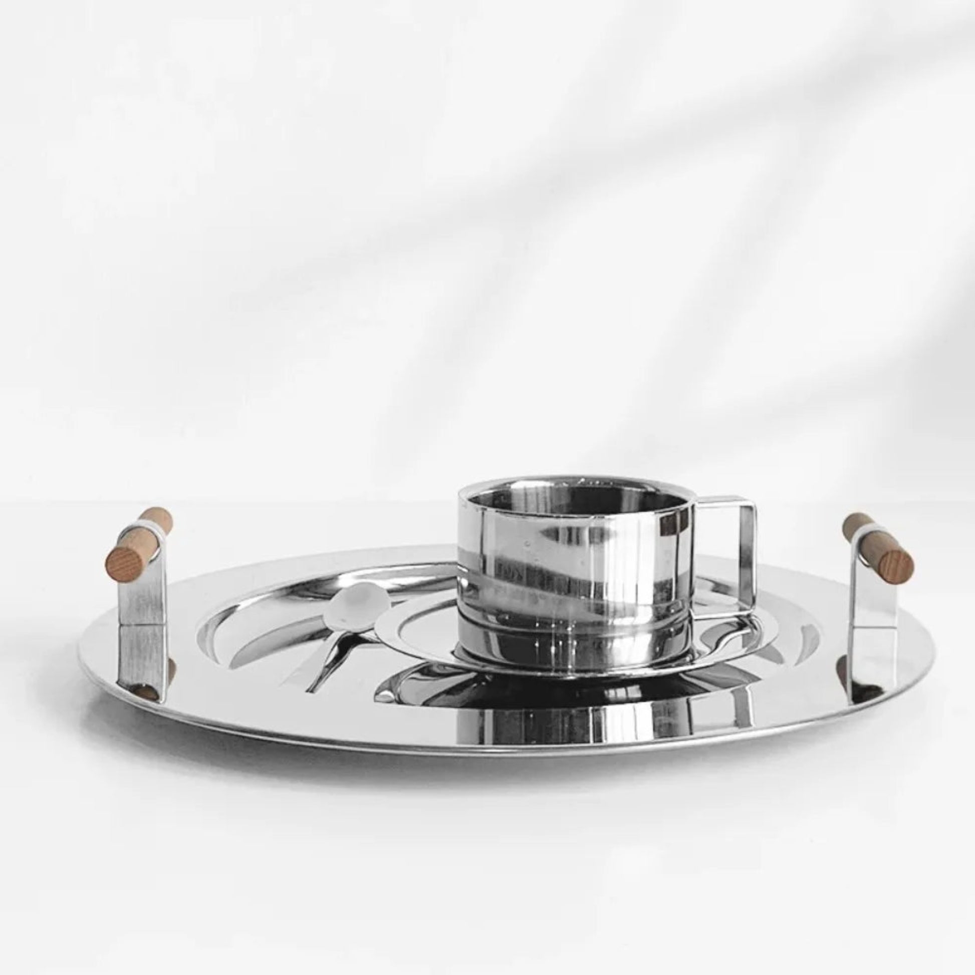 Stainless steel coffee set with cup and tray on a white background