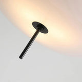 Modern wall light fixture with a black finish on a neutral background