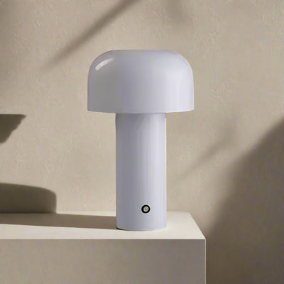 White table lamp with dimensions indicated on a dark background