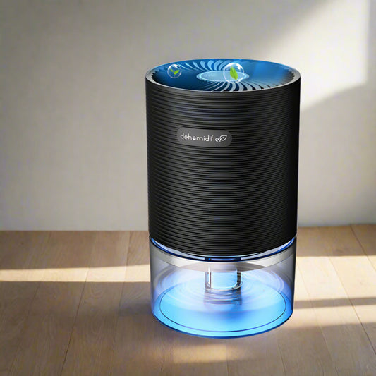 Black dehumidifier with water droplet graphics and price range indicators on a white background