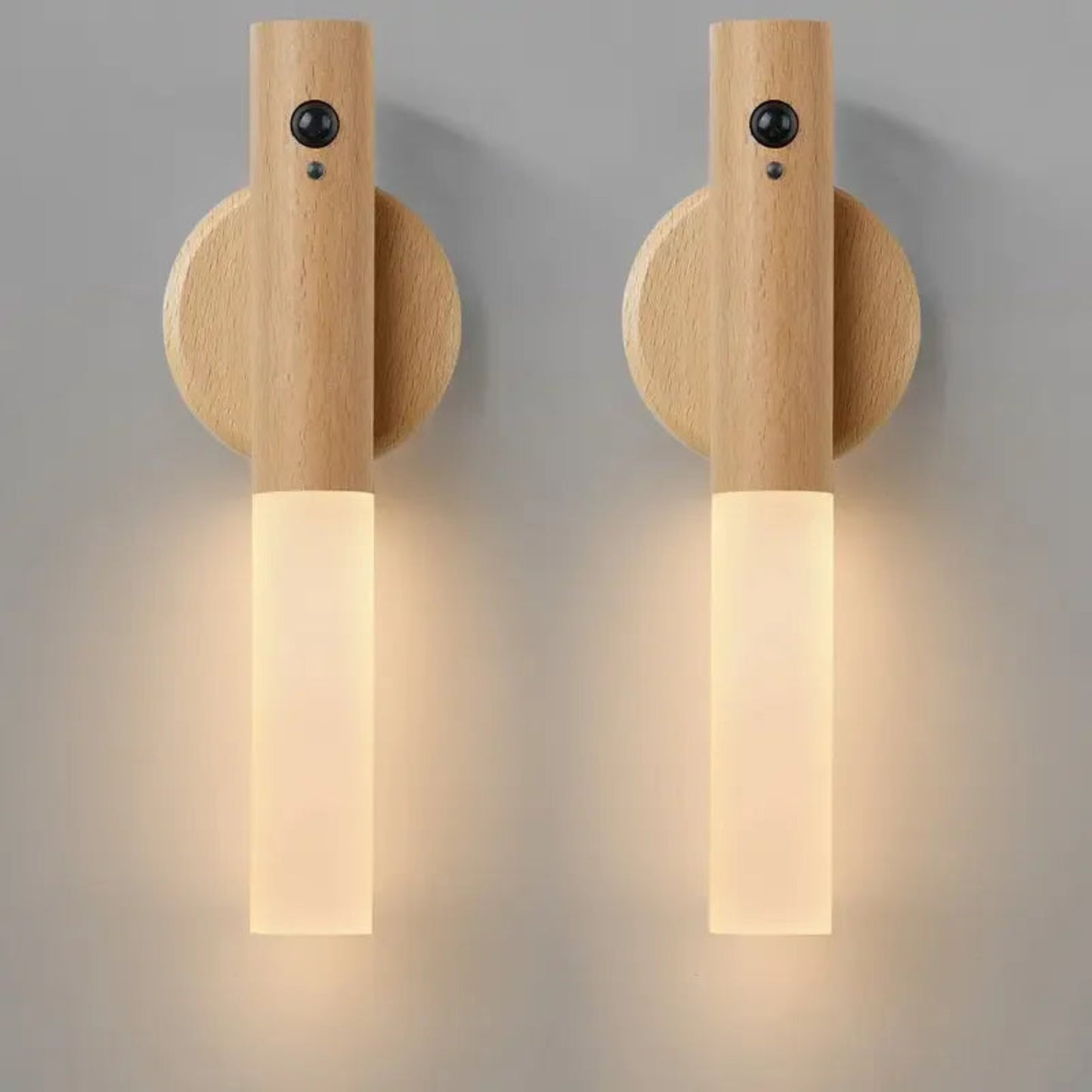 Two wooden wall sconces on a gray background
