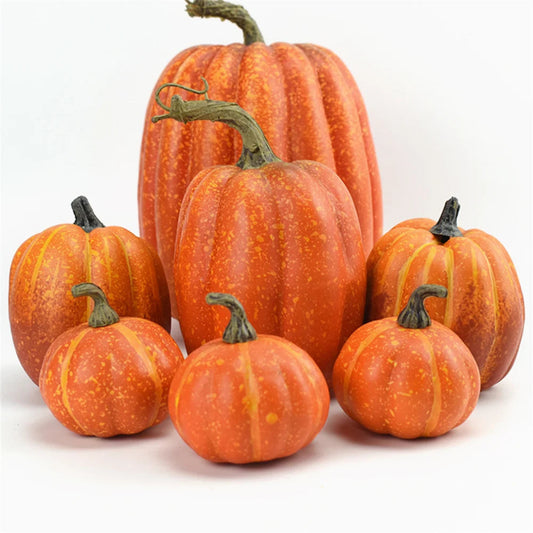 Group of orange pumpkins on a white background