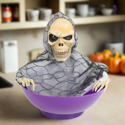 Skeleton figure with a purple bowl on a white background