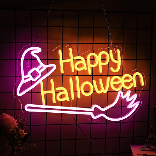 Neon sign with 'Happy Halloween' text and witch hat design on a dark tiled wall.