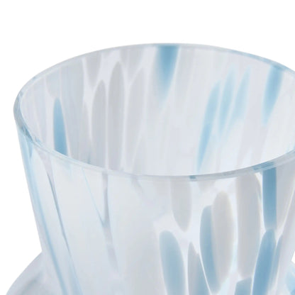 Clear plastic cup with blue tint on a white background