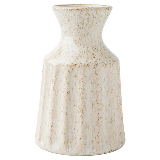 White ceramic vase with a textured surface on a white background
