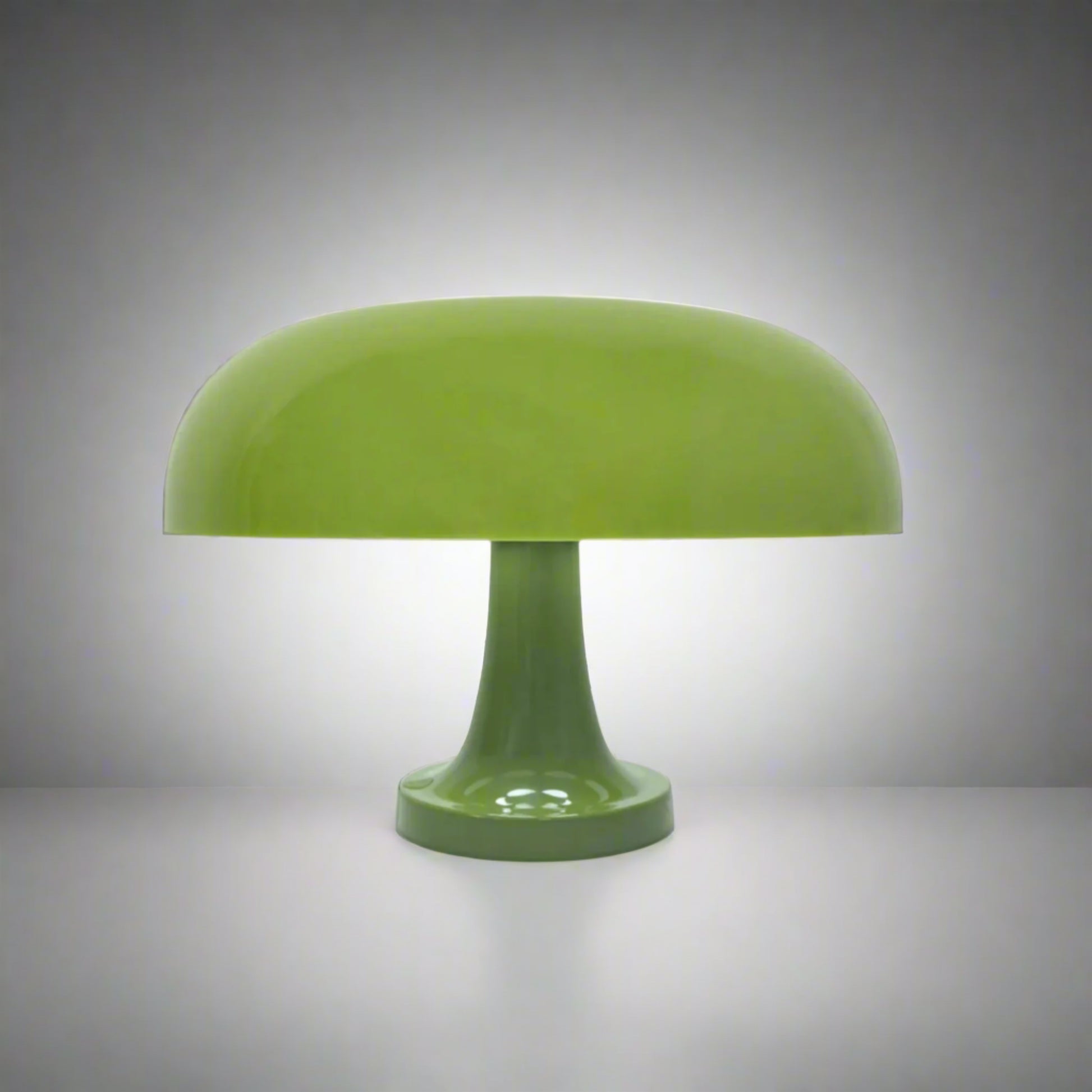 Green table lamp on a neutral surface 

