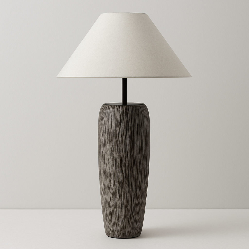 Table lamp with wooden base and white shade on a plain background