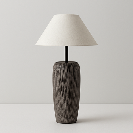 Table lamp with textured wooden base and beige lampshade on a light gray background