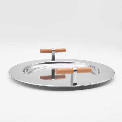 Stainless steel tray with wooden handles on a white background