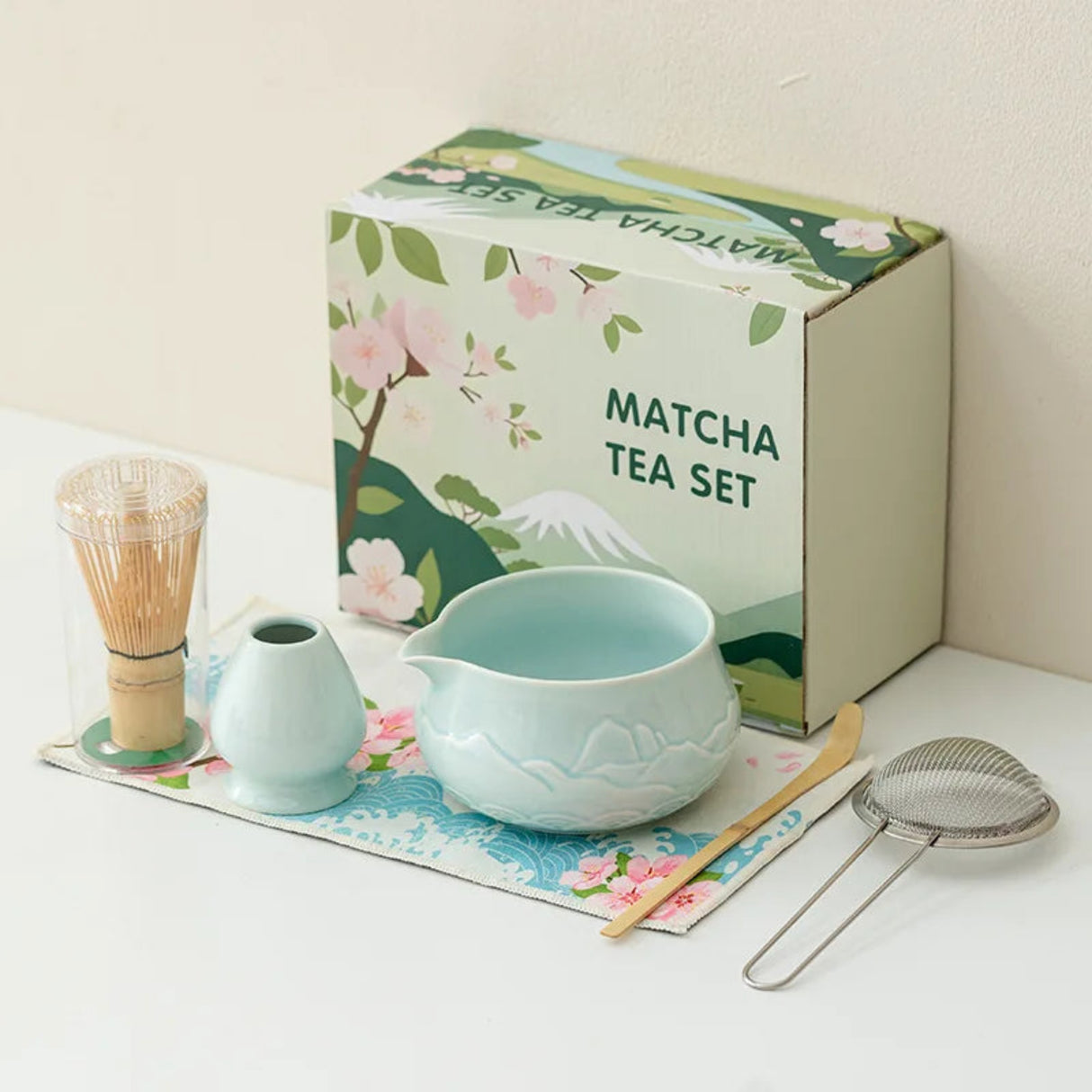 Matcha tea set with a matching box on a white surface