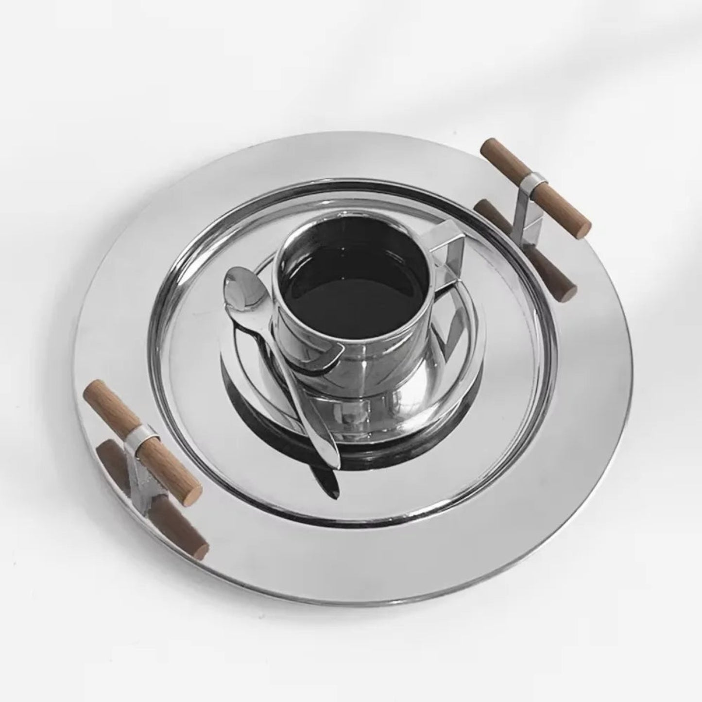 Chrome stove burner with wooden handles on a white background