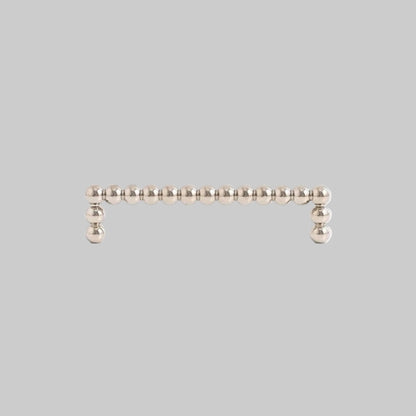 Measurement chart of a beaded handle with dimensions on a white background