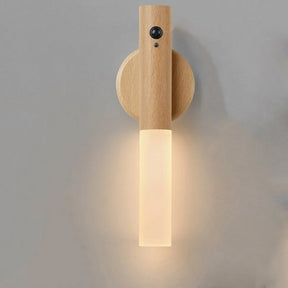 Wooden wall sconce with a light fixture on a gray background