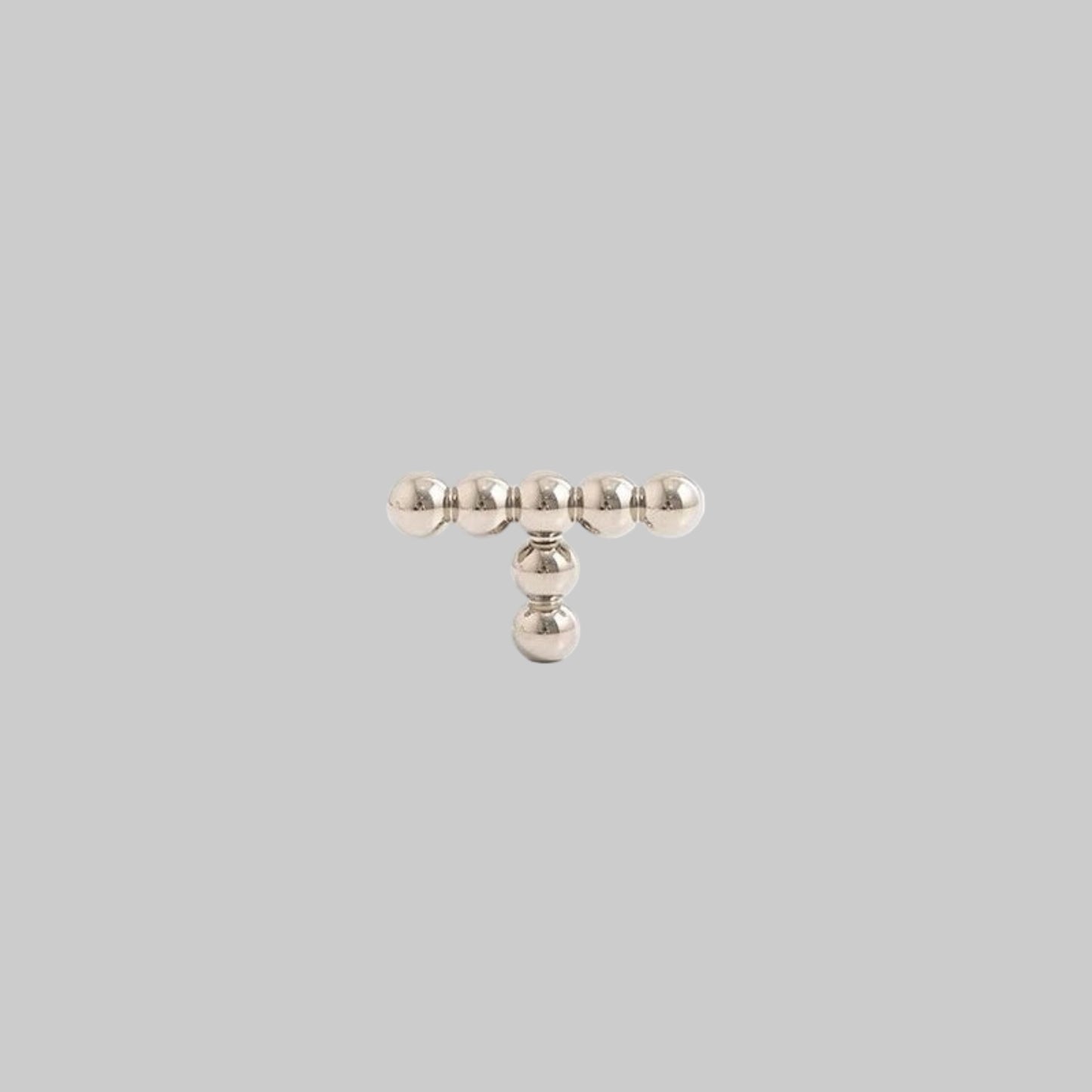 Measurement chart of a metallic object with dimensions and weight on a white background