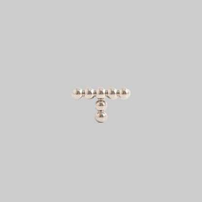 Measurement chart of a metallic object with dimensions and weight on a white background